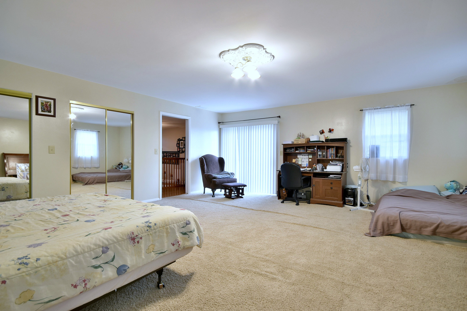 16989 East Ritchie Road Rochelle, IL 61068 - Photo 32 of 81 a bed room with a bed and a tv