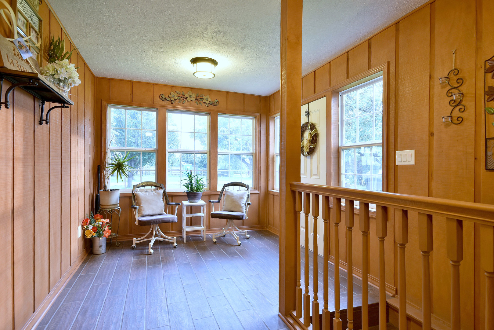 16989 East Ritchie Road Rochelle, IL 61068 - Photo 33 of 81 a living room with furniture and a wooden floor