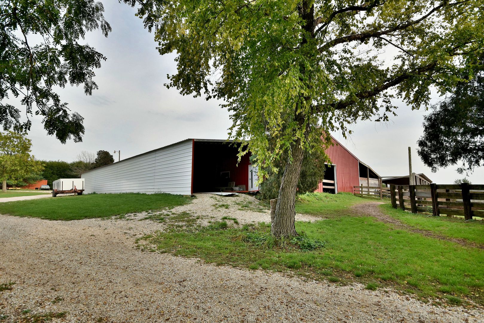 16989 East Ritchie Road Rochelle, IL 61068 - Photo 63 of 81 a front view of a house with a yard and trees