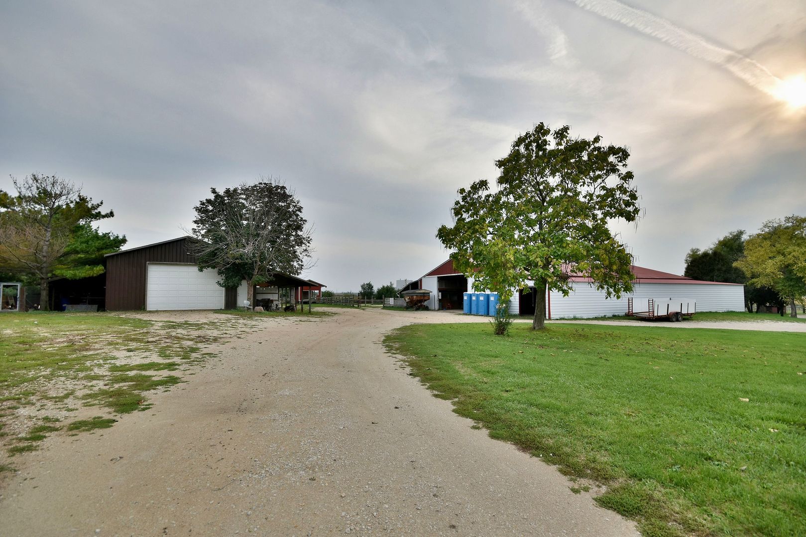 16989 East Ritchie Road Rochelle, IL 61068 - Photo 72 of 81 a front view of a house with a yard and trees