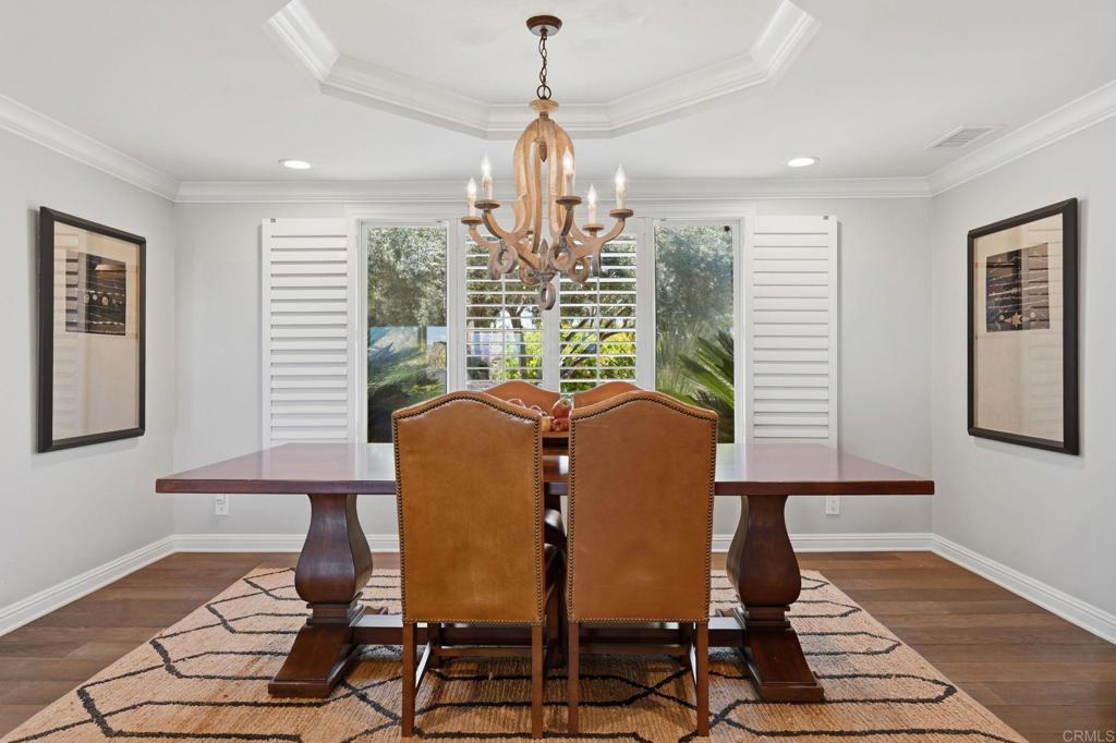 560 Rancho Camino Fallbrook, CA 92028 - Photo 21 of 70 a view of a dining room with furniture window and wooden floor