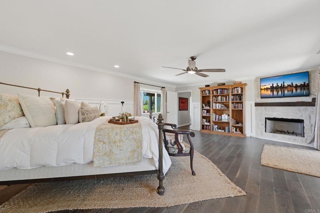 560 Rancho Camino Fallbrook, CA 92028 - Photo 25 of 70 a living room with furniture and a fireplace