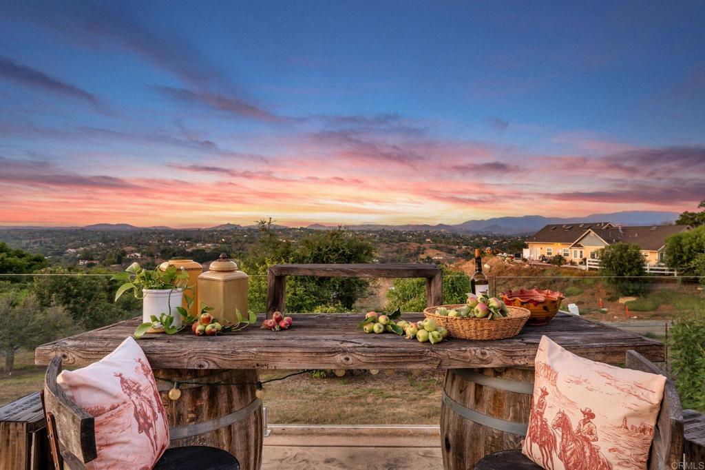 560 Rancho Camino Fallbrook, CA 92028 - Photo 3 of 70 a view of a balcony with two chairs and a table
