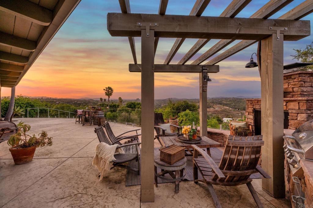 560 Rancho Camino Fallbrook, CA 92028 - Photo 38 of 70 a view of a terrace with furniture and a yard