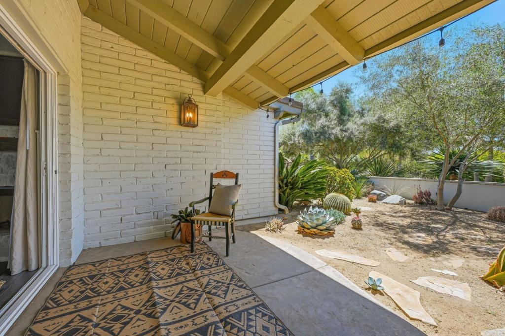 560 Rancho Camino Fallbrook, CA 92028 - Photo 50 of 70 a view of a chairs and table in backyard