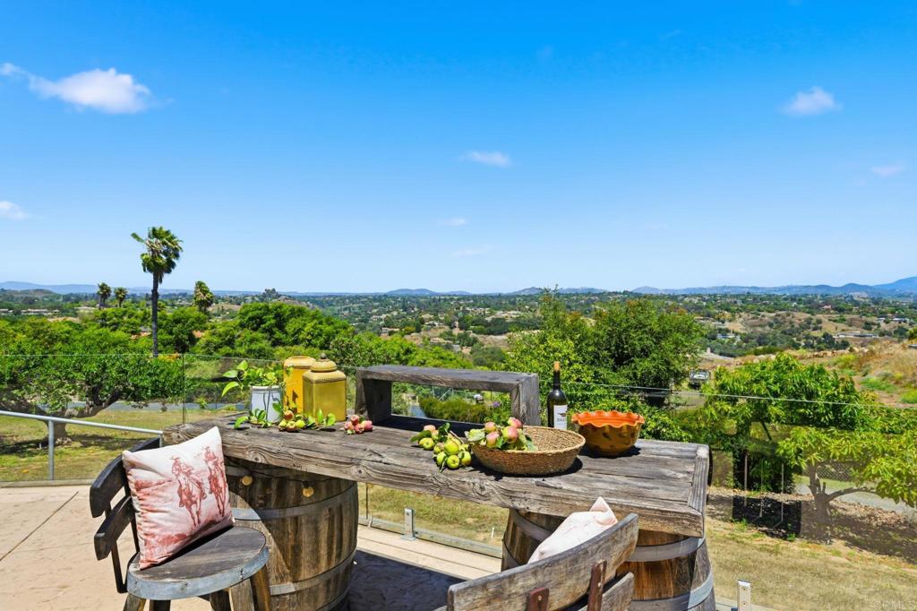 560 Rancho Camino Fallbrook, CA 92028 - Photo 55 of 70 a view of a chairs and table in patio