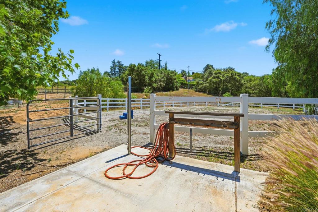 560 Rancho Camino Fallbrook, CA 92028 - Photo 62 of 70 a view of swimming pool with seating space and trees in the background