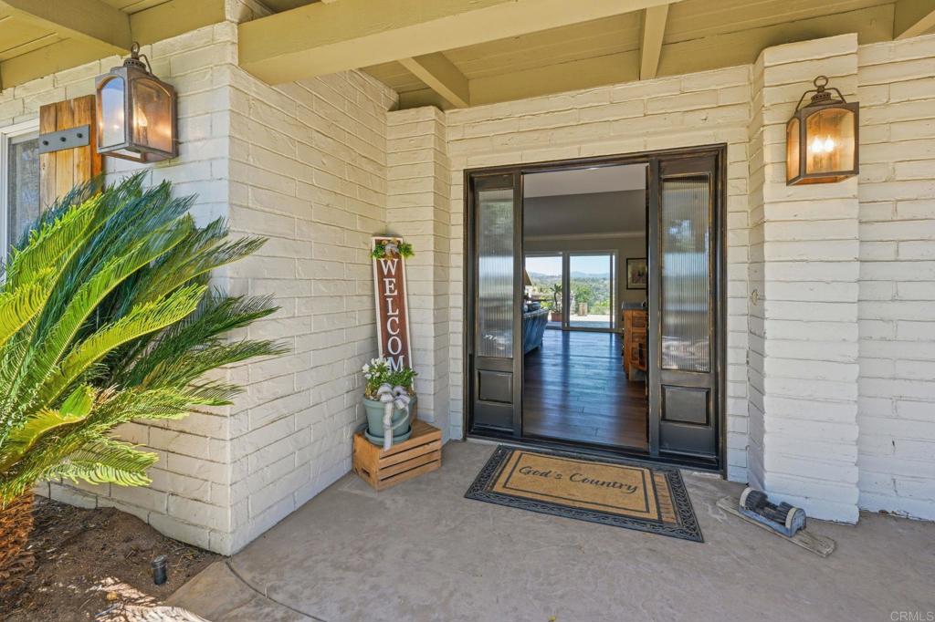 560 Rancho Camino Fallbrook, CA 92028 - Photo 7 of 70 a view of a entryway door front of house