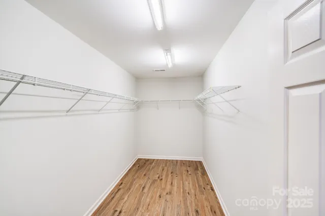 a view of a room with racks on the wall