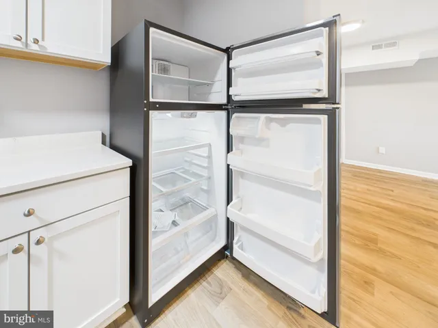 a view of small space with wooden floor