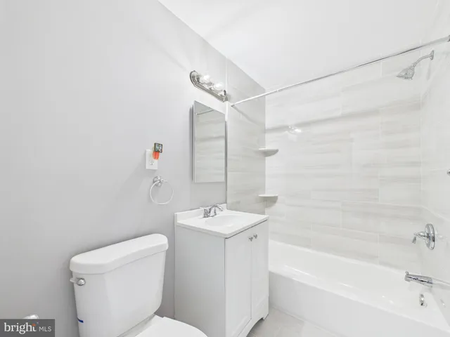 a bathroom with a sink and a bathtub