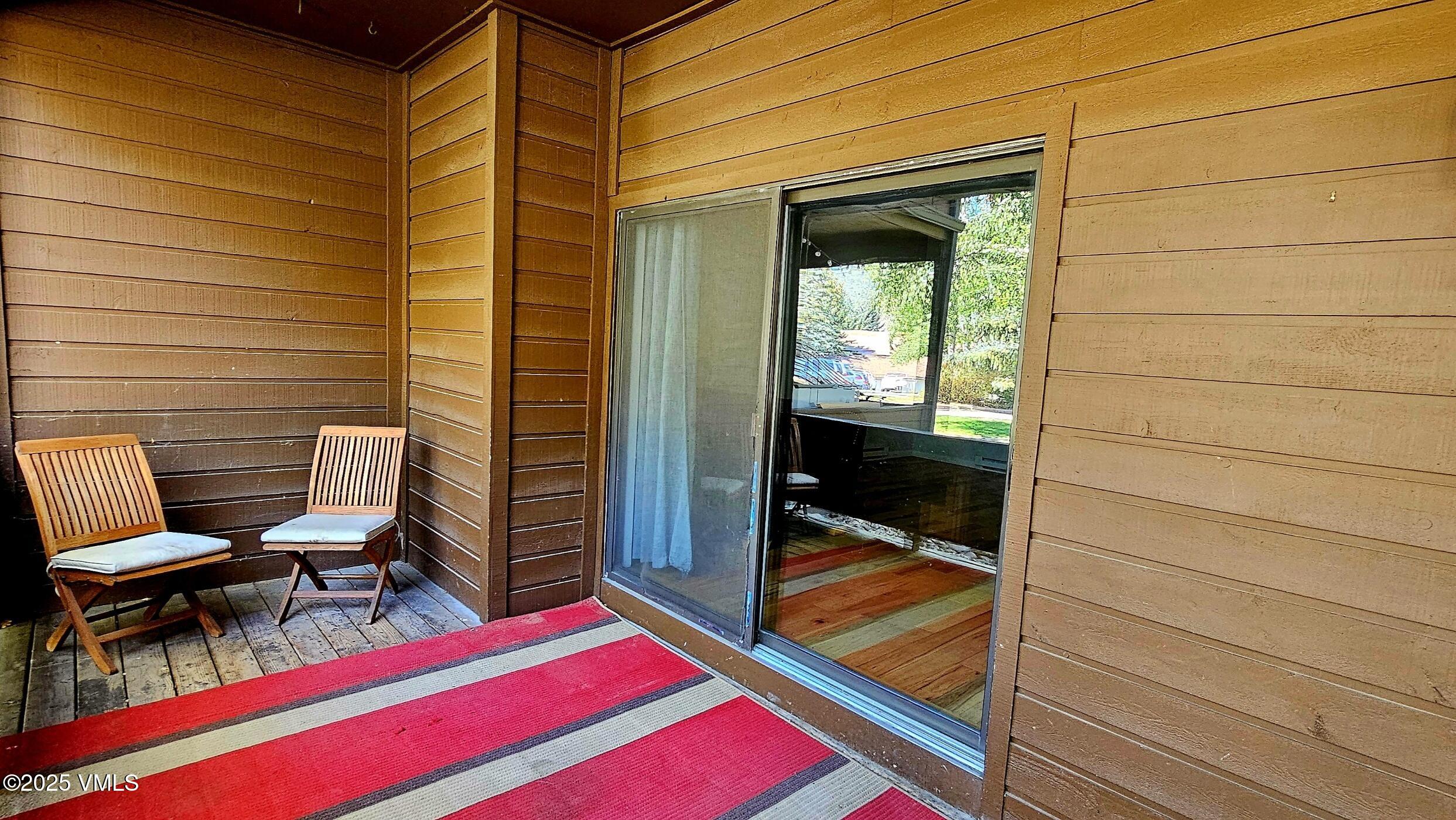 165 Gopher Road, Unit 25 Avon, CO 81620 - Photo 9 of 17 a balcony with table and chairs