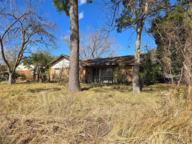 a view of a house with snow on the wall