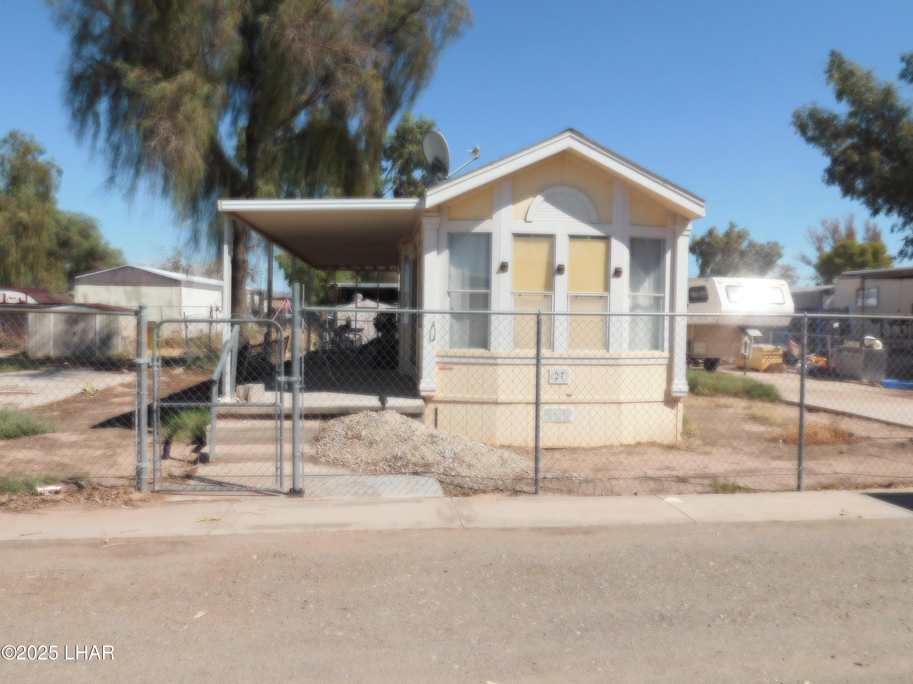48792 Sourdough Road, Unit 27 Ehrenberg, AZ 85334 - Photo 1 of 4 a view of a house