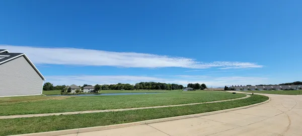 a view of a golf course with a garden
