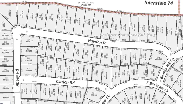 a black white and white photo of a black gate