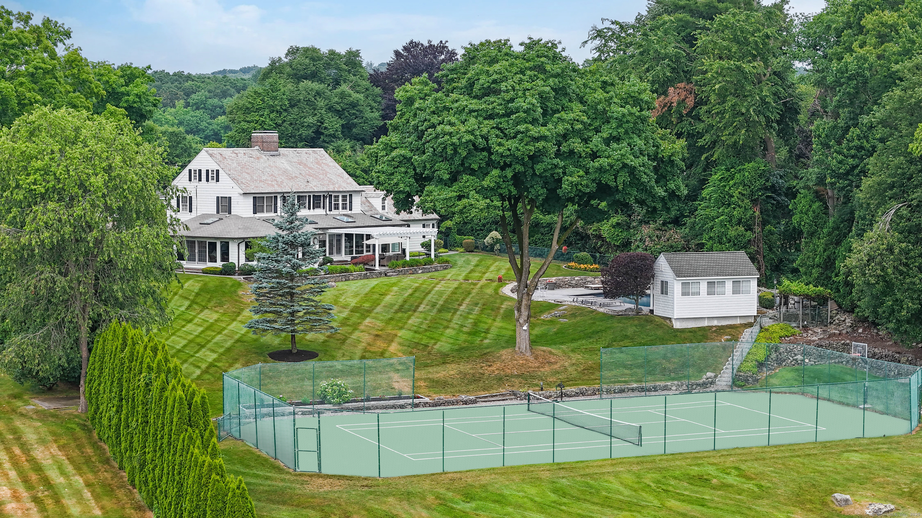 77 Eastfield Road Waterbury, CT 06708 - Photo 30 of 40 a view of a house with a yard