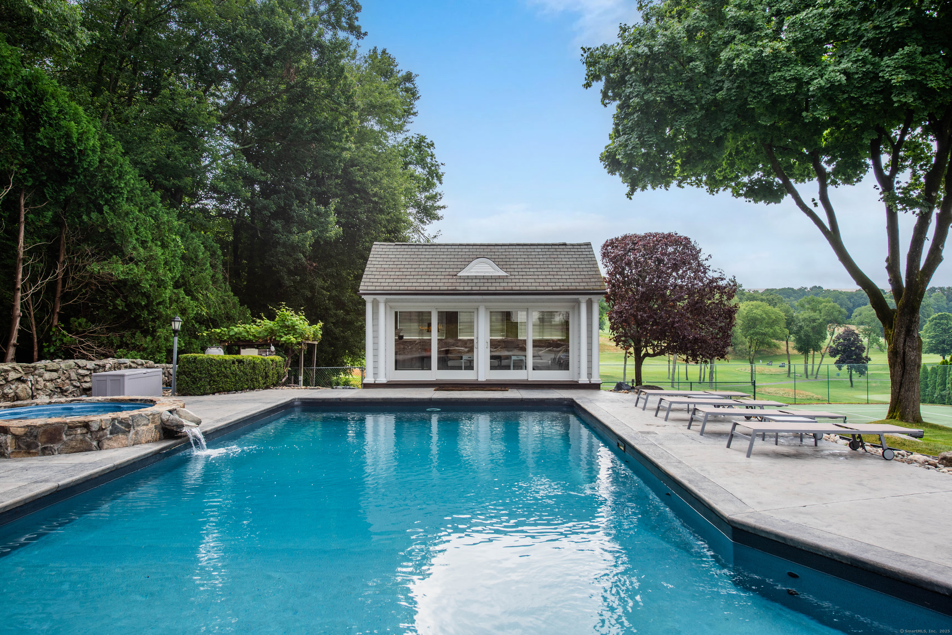 77 Eastfield Road Waterbury, CT 06708 - Photo 31 of 40 a view of a house with pool and sitting area