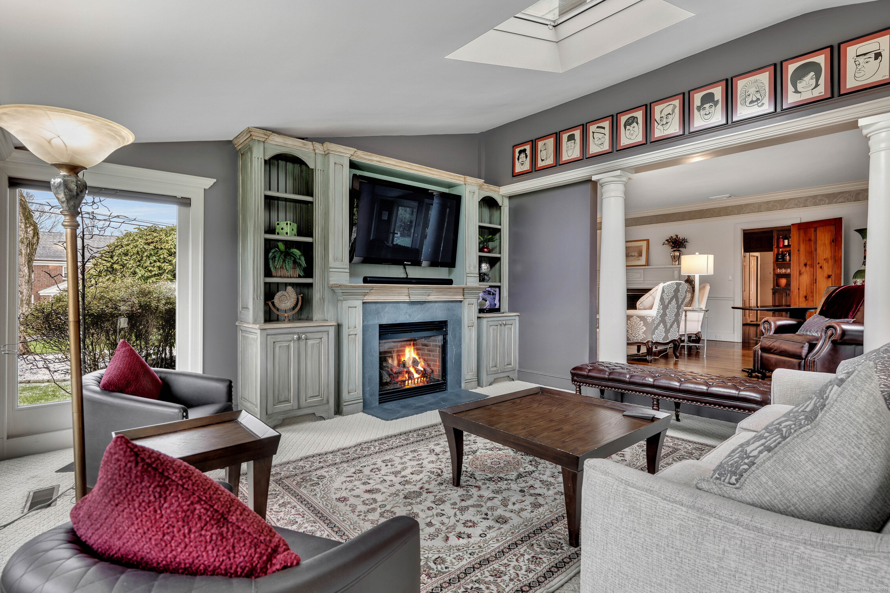 77 Eastfield Road Waterbury, CT 06708 - Photo 40 of 40 a living room with furniture a fireplace and a large window
