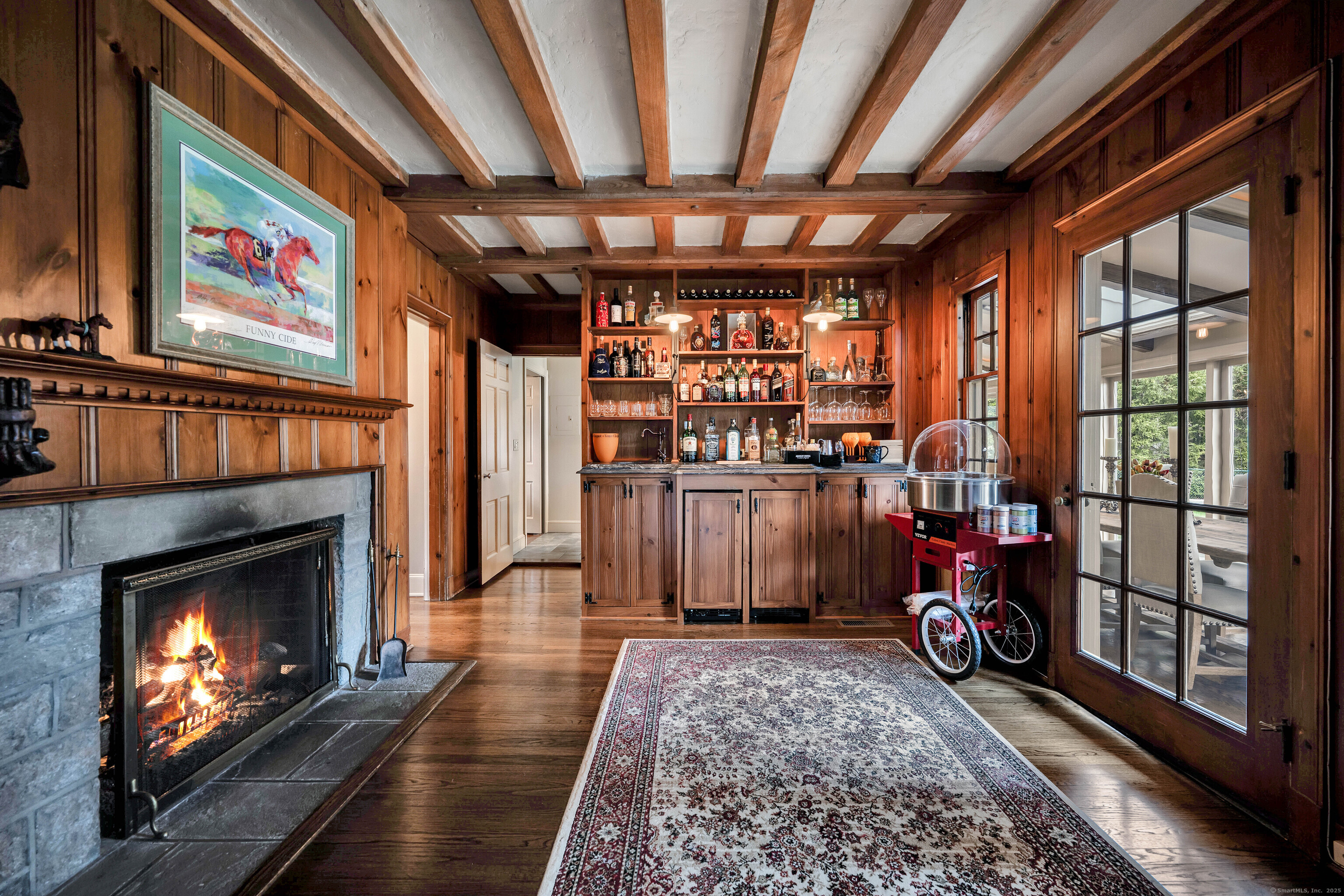 77 Eastfield Road Waterbury, CT 06708 - Photo 5 of 40 a room with lots of furniture and a fireplace