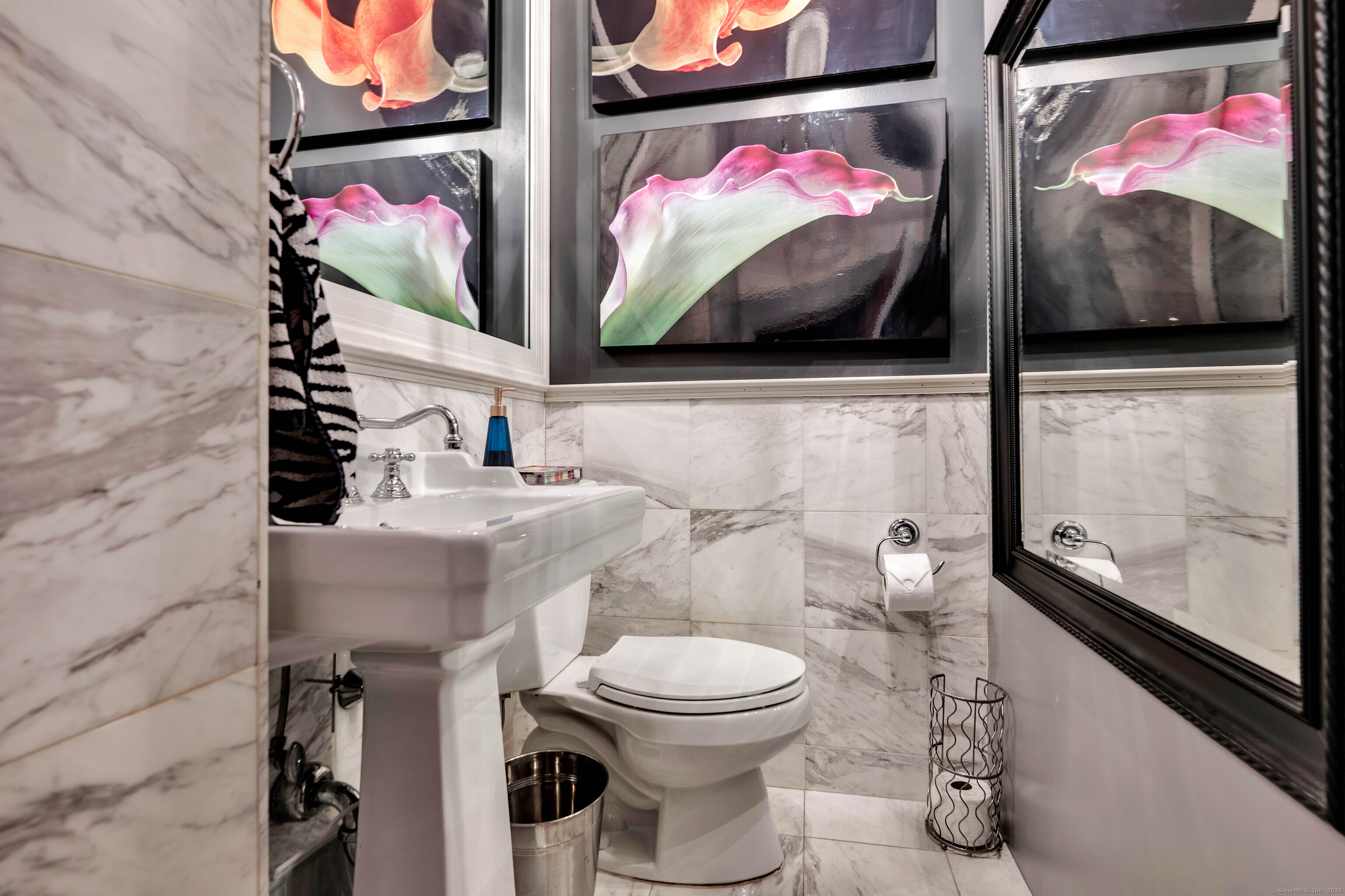 77 Eastfield Road Waterbury, CT 06708 - Photo 7 of 40 a bathroom with a toilet sink and mirror