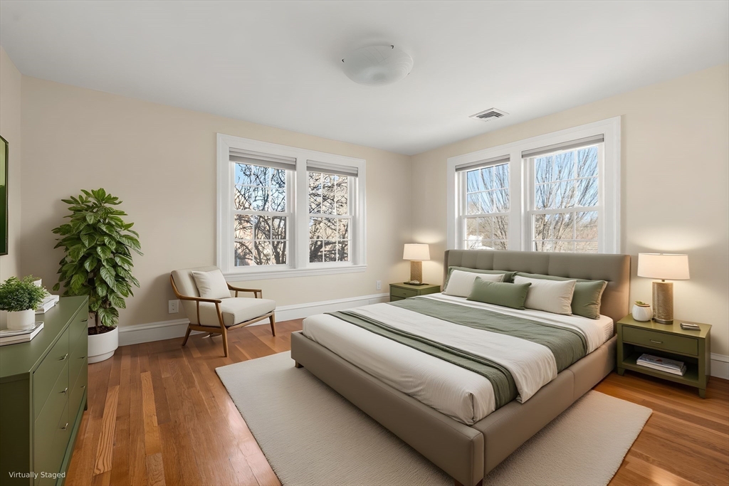 25 Allen Avenue Newton, MA 02468 - Photo 11 of 19 a bedroom with a bed and a couch