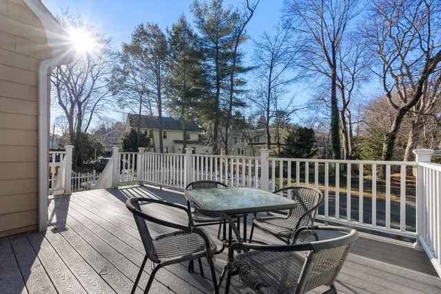 a view of a chairs and table on the deck