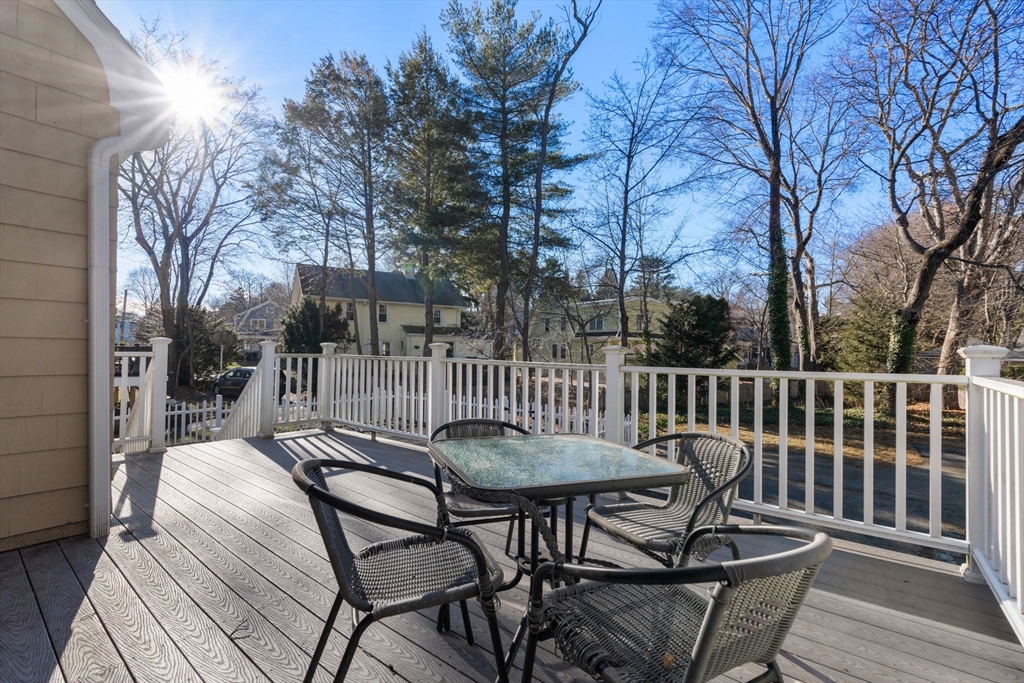 25 Allen Avenue Newton, MA 02468 - Photo 19 of 19 a view of a chairs and table on the deck