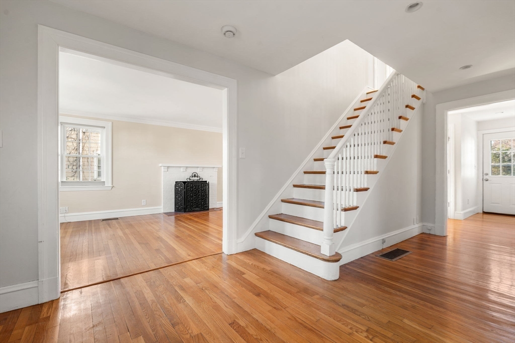 25 Allen Avenue Newton, MA 02468 - Photo 3 of 19 a view of entryway with wooden floor and front door