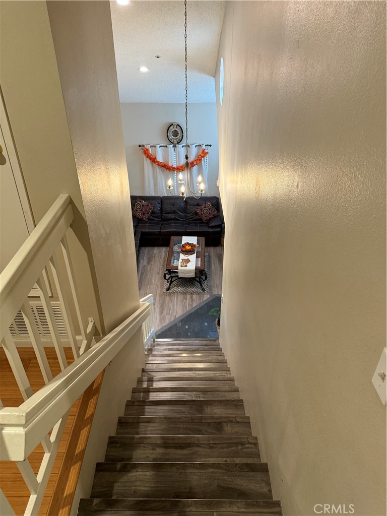 13584 Sutter Court Fontana, CA 92336 - Photo 15 of 46 a view of entryway and hall with wooden floor