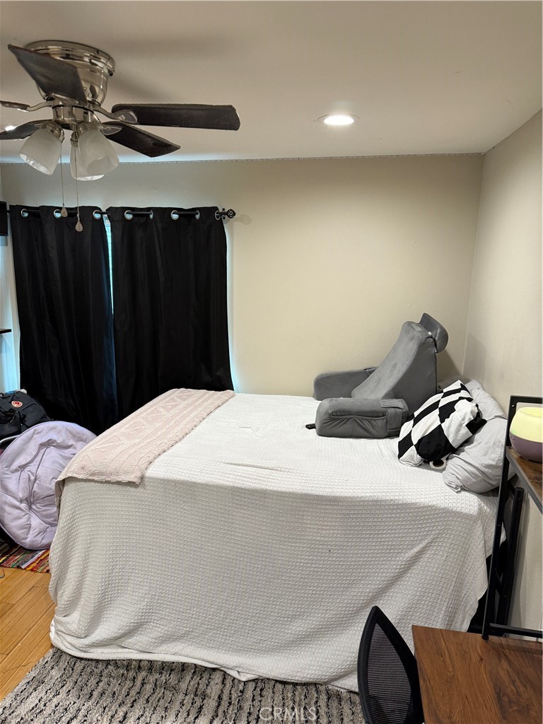 13584 Sutter Court Fontana, CA 92336 - Photo 18 of 46 a bed room with a bed