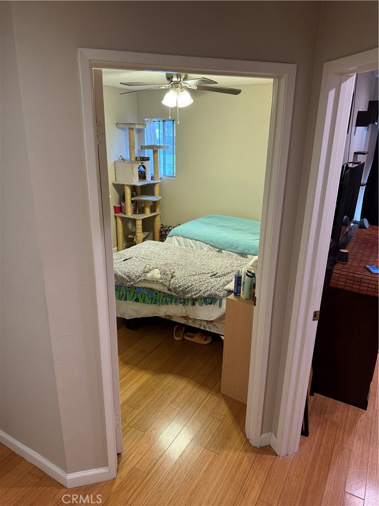 13584 Sutter Court Fontana, CA 92336 - Photo 21 of 46 a bedroom with a bed and a mirror