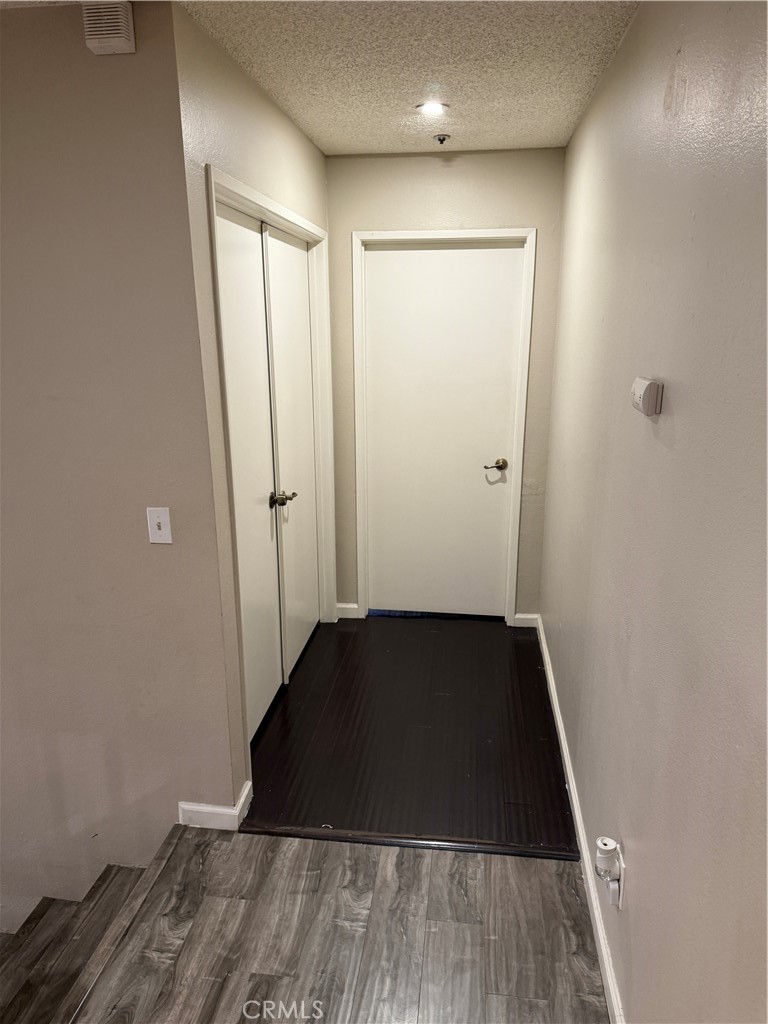 13584 Sutter Court Fontana, CA 92336 - Photo 28 of 46 a view of a hallway