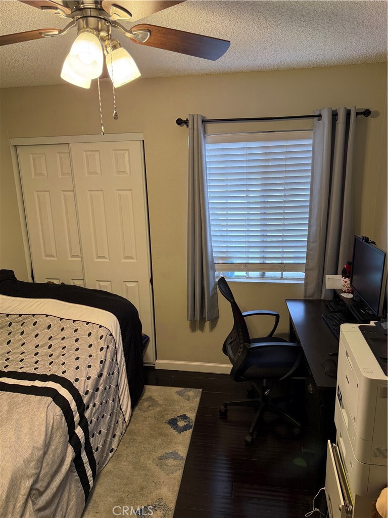 13584 Sutter Court Fontana, CA 92336 - Photo 30 of 46 a bedroom with a bed and a window