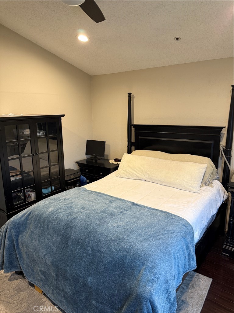 13584 Sutter Court Fontana, CA 92336 - Photo 34 of 46 a large bed sitting in a bedroom and balcony