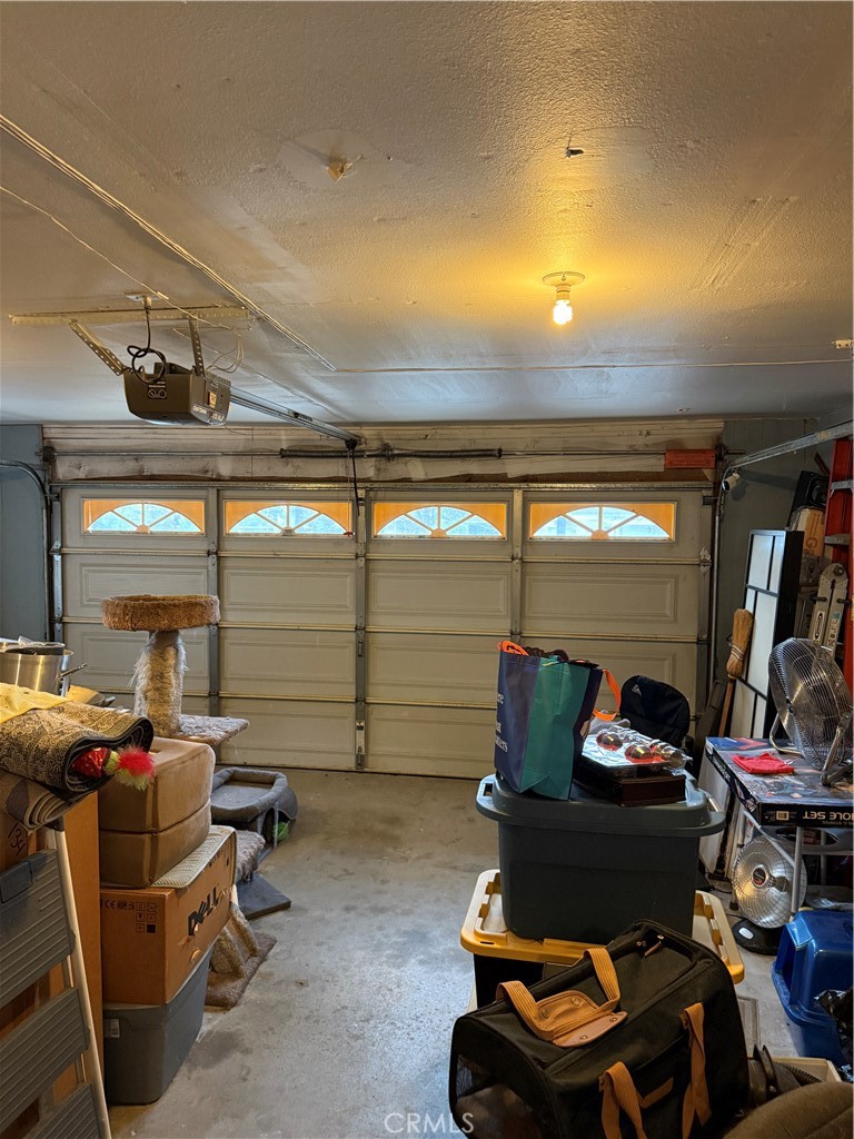 13584 Sutter Court Fontana, CA 92336 - Photo 44 of 46 a bedroom with furniture and a lamp