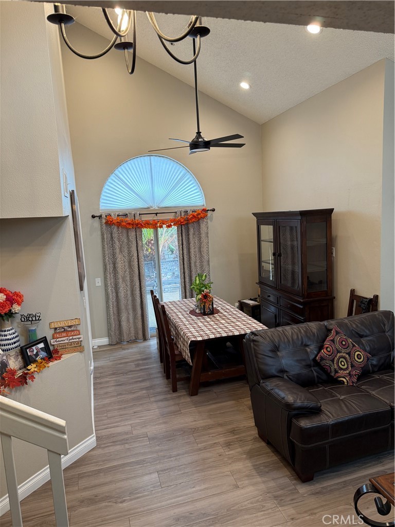 13584 Sutter Court Fontana, CA 92336 - Photo 8 of 46 a living room with furniture and a wooden floor
