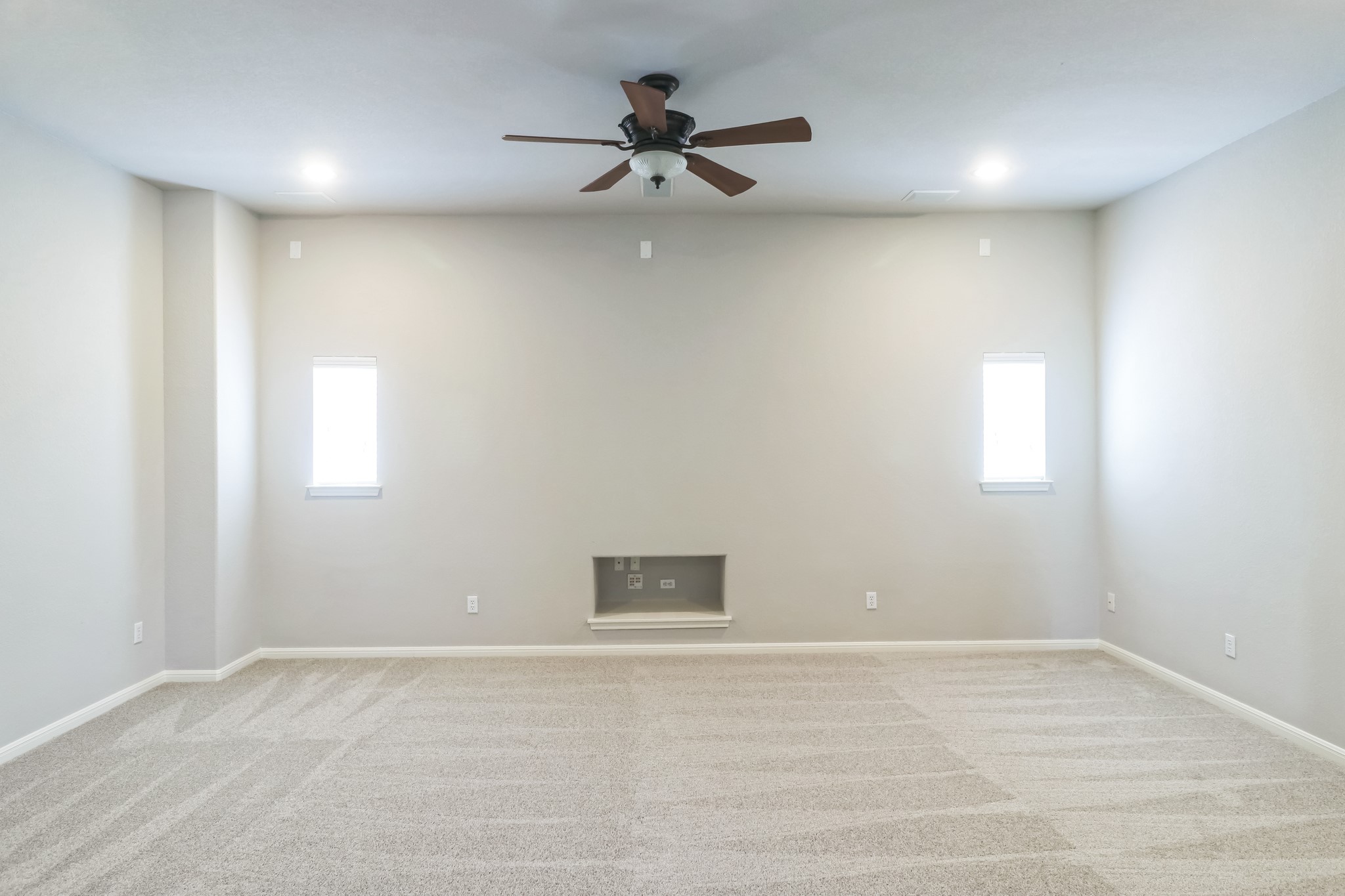 3913 Remington Road Cedar Park, TX 78613 - Photo 25 of 32 A spacious multi-purpose room featuring plush neutral carpeting and recessed media connections.