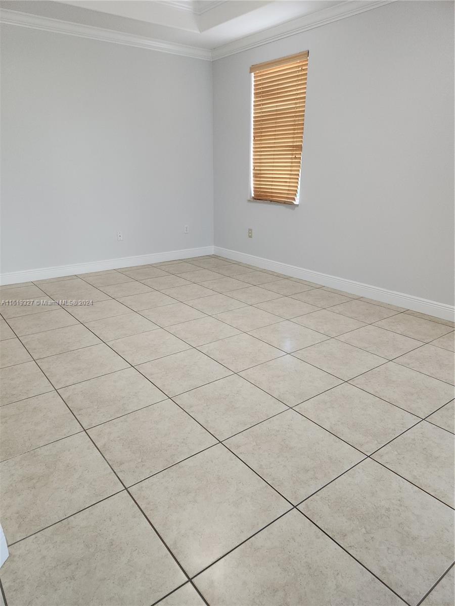 14201 Southwest 15th Street Miami, FL 33184 - Photo 25 of 37 an empty room with windows