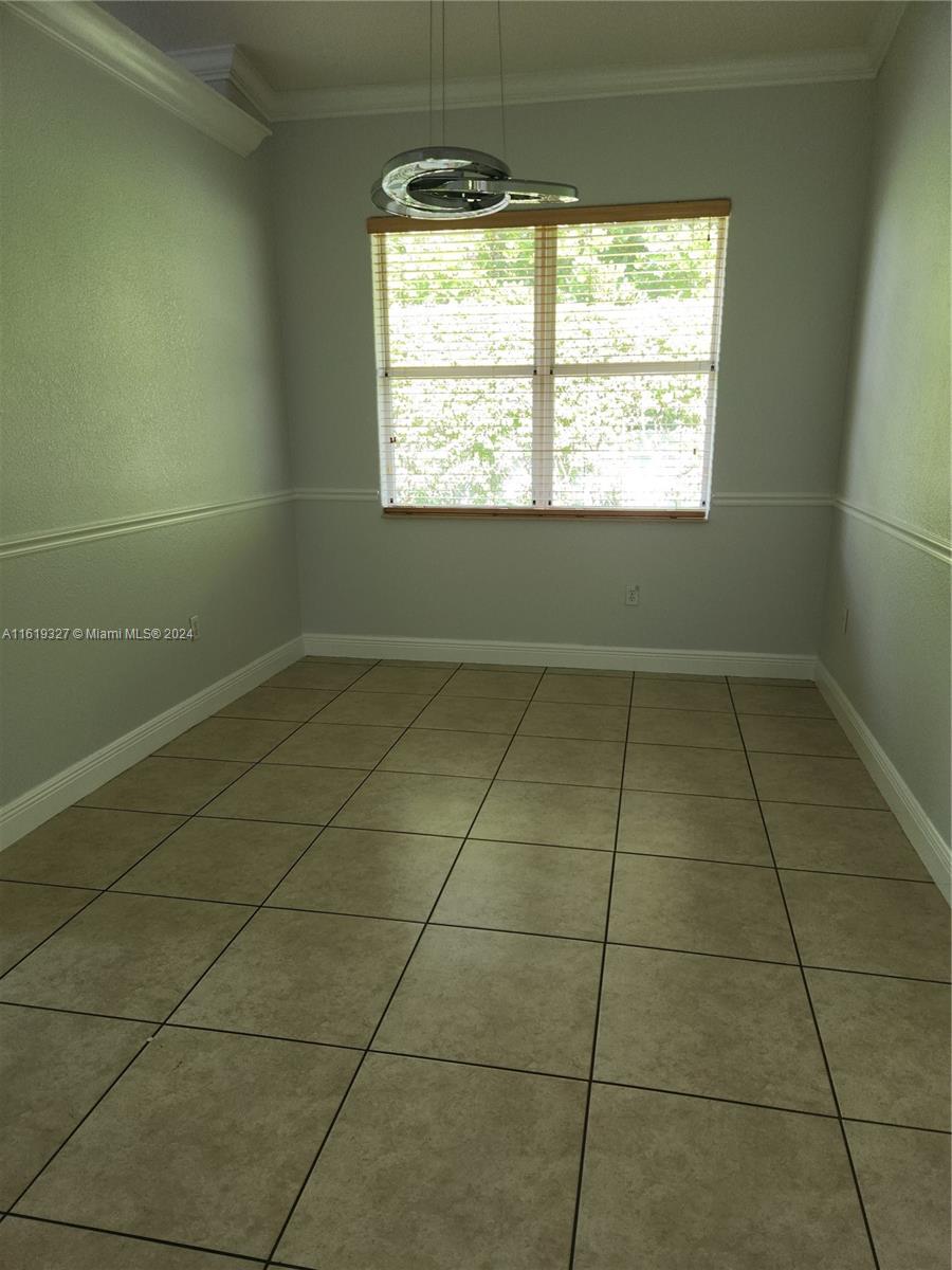 14201 Southwest 15th Street Miami, FL 33184 - Photo 27 of 37 a view of a room that has a window in it
