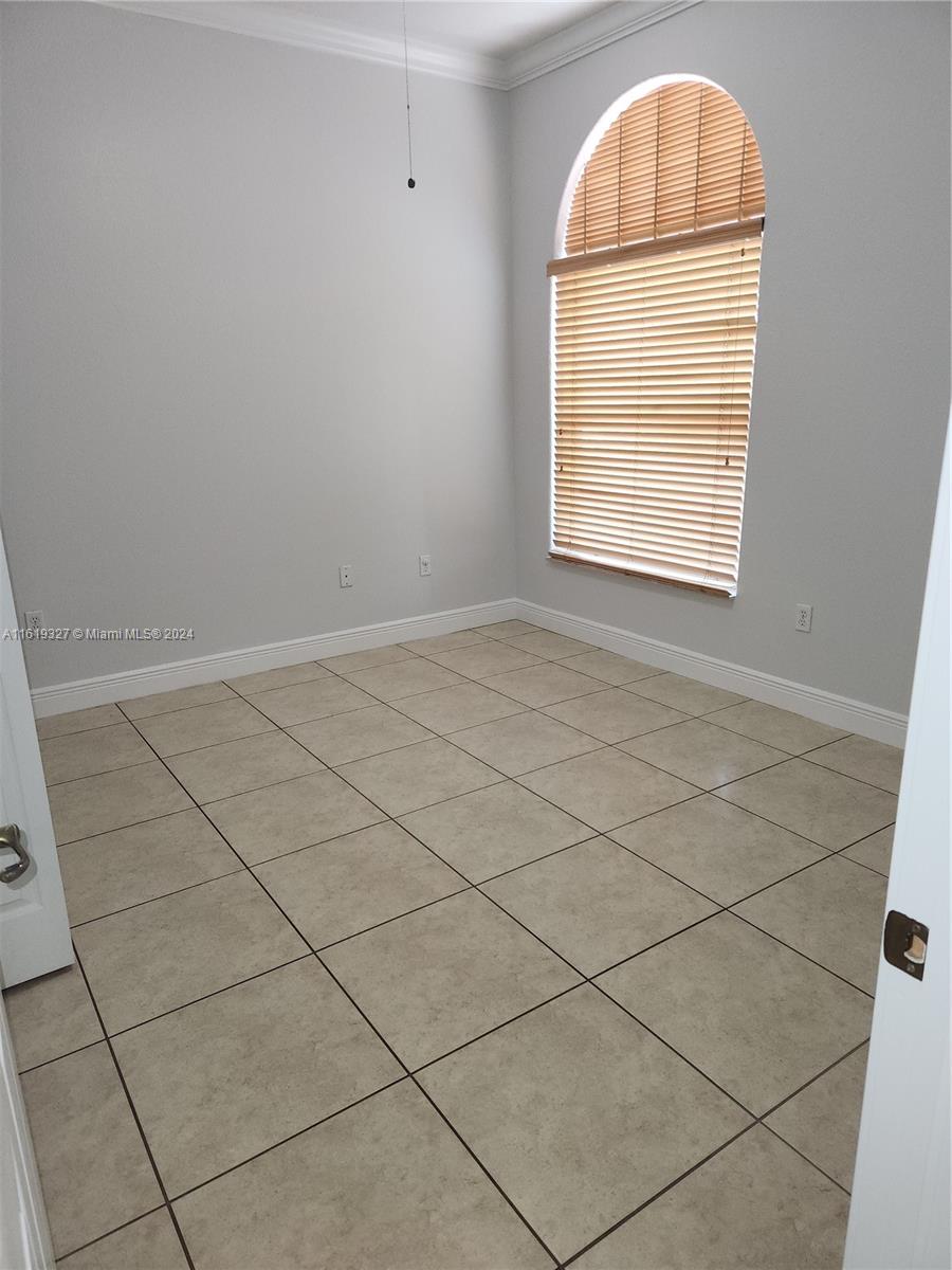 14201 Southwest 15th Street Miami, FL 33184 - Photo 29 of 37 an empty room with windows