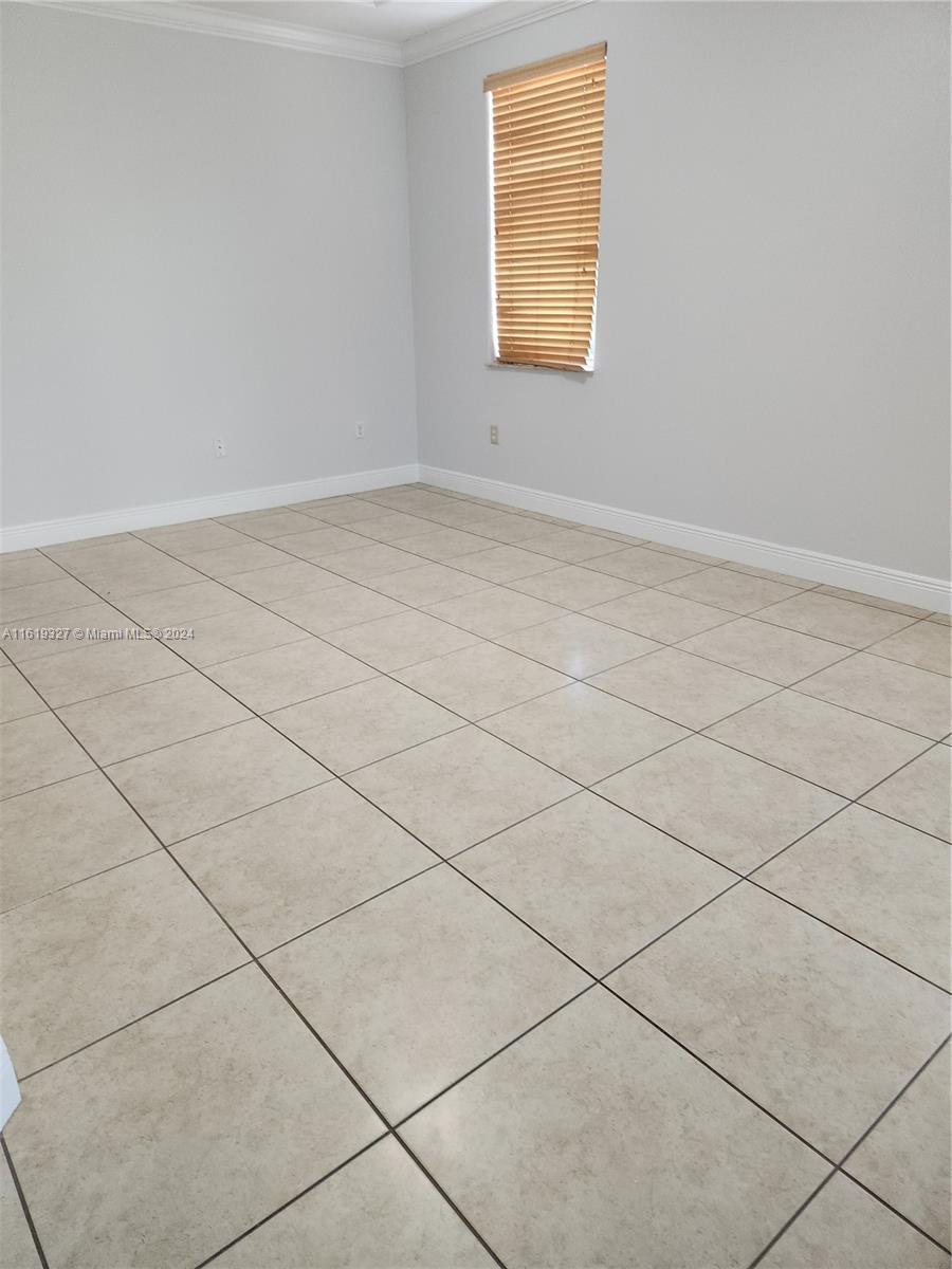 14201 Southwest 15th Street Miami, FL 33184 - Photo 30 of 37 an empty room with windows