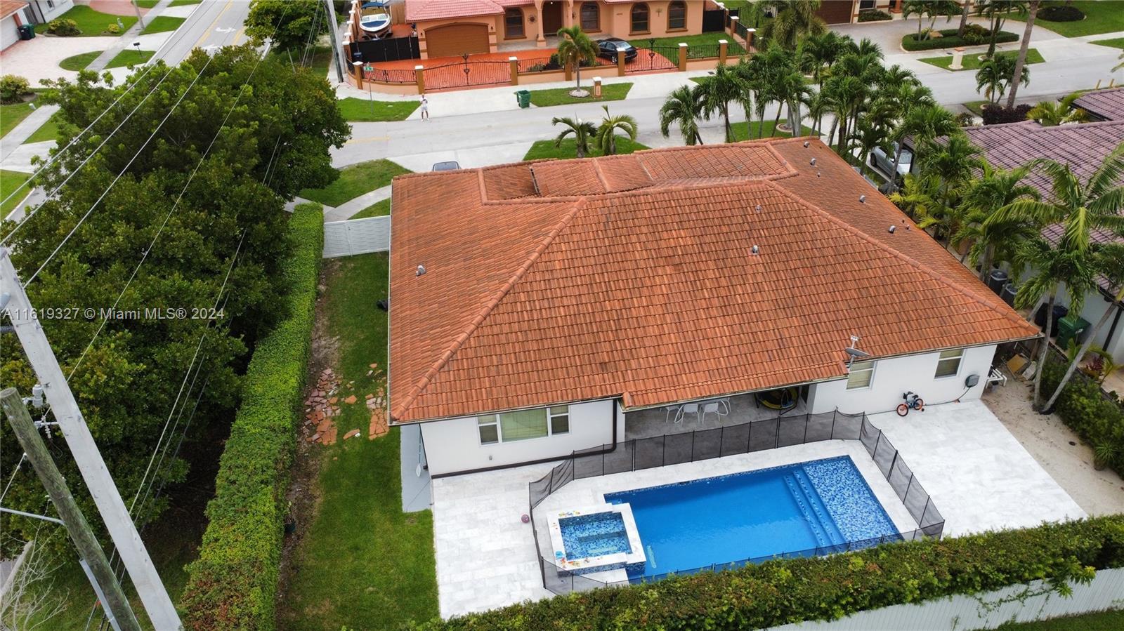 14201 Southwest 15th Street Miami, FL 33184 - Photo 35 of 37 an aerial view of a house with a yard