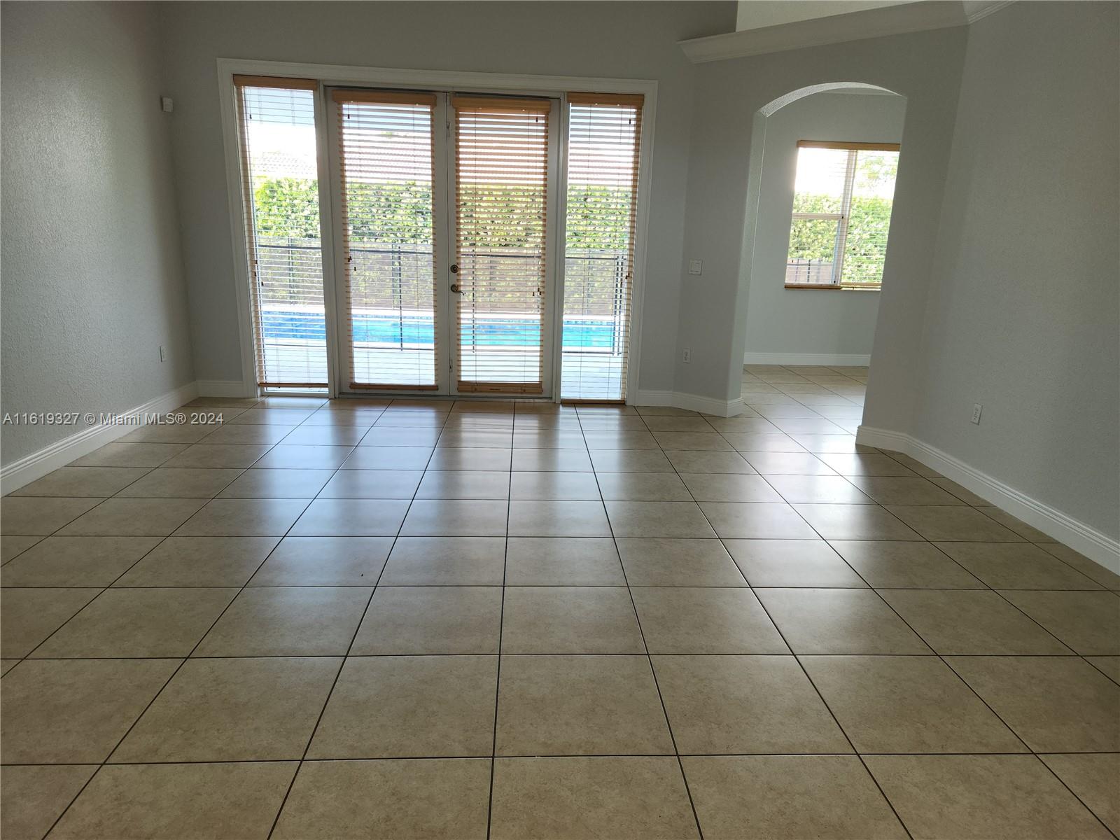 14201 Southwest 15th Street Miami, FL 33184 - Photo 7 of 37 a view of an empty room and window