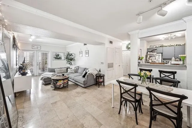 a living room with furniture and a table