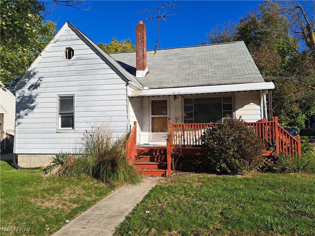 2245 North Ridge Road Lorain, OH 44055 - Photo 2 of 24 View of front of home with a front yard and a porch
