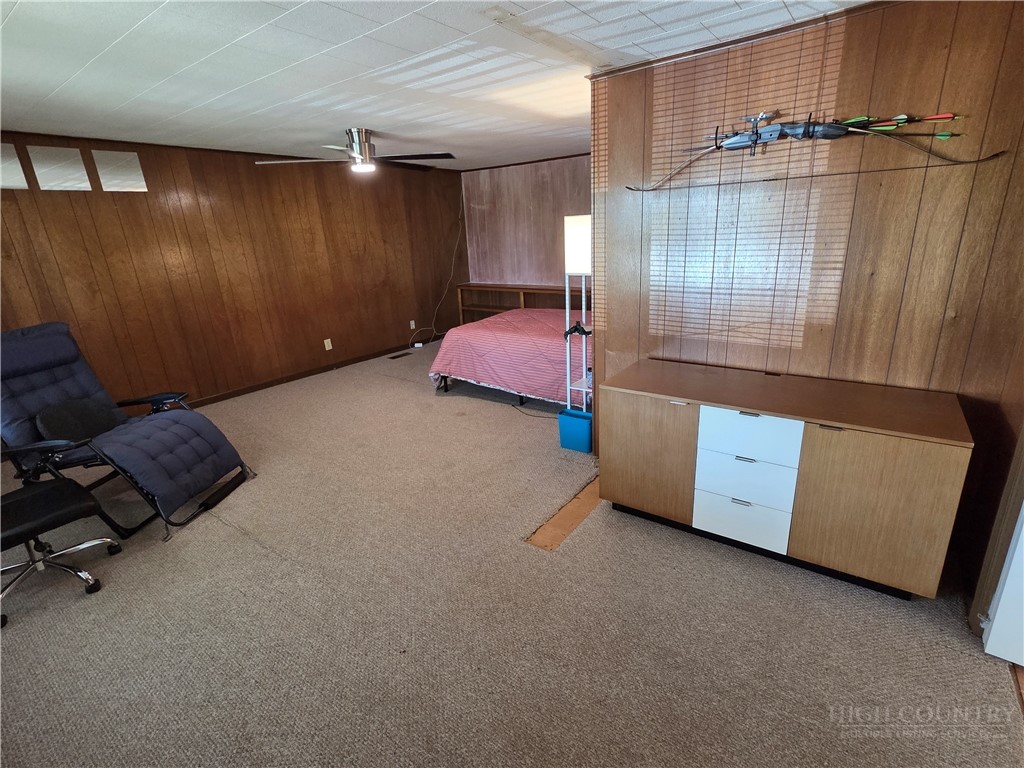 145 Black Oak Ridge Road Taylorsville, NC 28681 - Photo 18 of 39 a room with a bed and a dresser