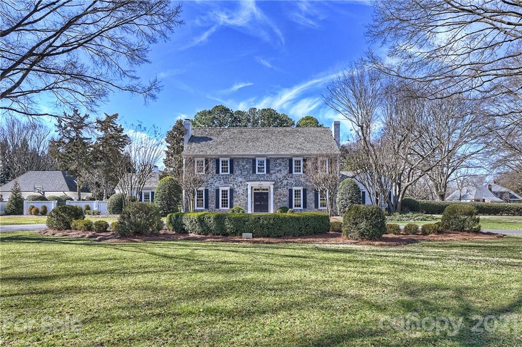 3400 Sharon Road Charlotte, NC 28211 - Photo 1 of 38 a front view of a house with a garden