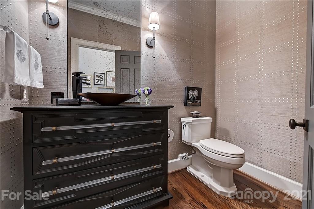 3400 Sharon Road Charlotte, NC 28211 - Photo 14 of 38 a bathroom with a sink and a toilet