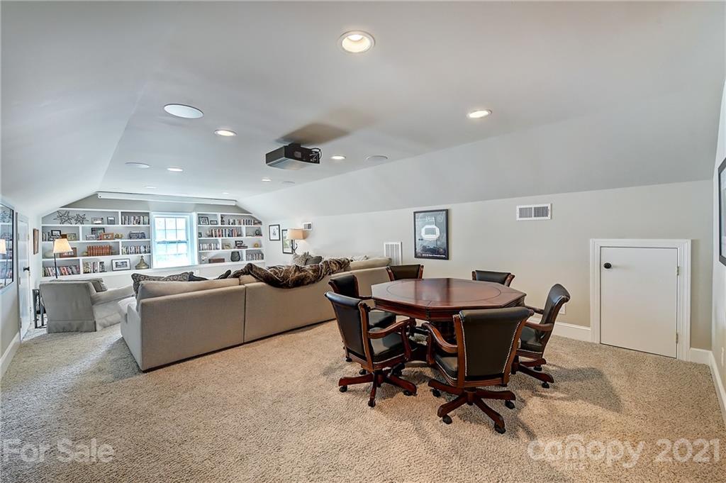 3400 Sharon Road Charlotte, NC 28211 - Photo 25 of 38 a view of a dining room with furniture and a window